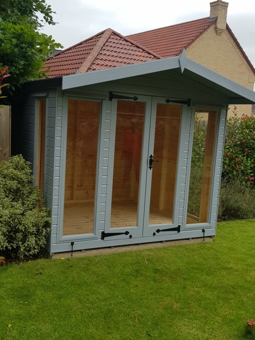 Garden Room in garden with 6 windows