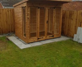 Garden Room in corner of back garden on patio pad